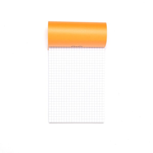 notebook with orange grid