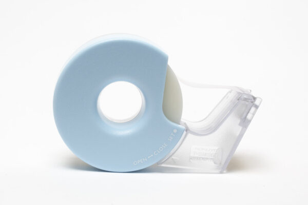 tape dispenser with cutting feature